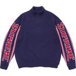 Jacquard Sleeve Half Zip Sweater