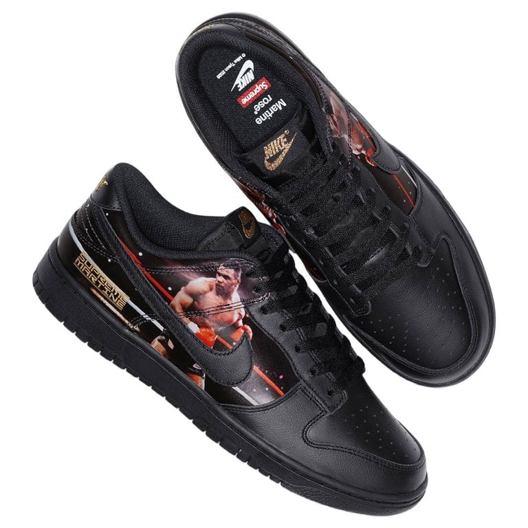 Supreme x Martine Rose x Nike Dunk Low Mike Tyson JA1868-001 hero image showing black leather upper with full-colour Tyson photo across lateral quarter and heel